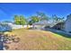 Spacious backyard with a screened-in pool at 415 W Beacon Rd, Lakeland, FL 33803