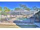Inviting screened-in swimming pool in the backyard at 415 W Beacon Rd, Lakeland, FL 33803