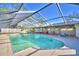 Enclosed pool area with screened enclosure at 415 W Beacon Rd, Lakeland, FL 33803