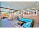 Relaxing covered patio with seating and pool views at 415 W Beacon Rd, Lakeland, FL 33803