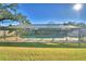 Enclosed rectangular swimming pool in backyard at 415 W Beacon Rd, Lakeland, FL 33803