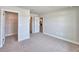 Bright bedroom features a walk-in closet and open doorway, providing ample storage and easy access at 4682 Grandview Glen Dr, Auburndale, FL 33823