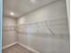 Walk-in closet features carpet and wire shelves at 4682 Grandview Glen Dr, Auburndale, FL 33823