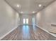 Spacious living room with recessed lighting and access to a backyard patio at 4682 Grandview Glen Dr, Auburndale, FL 33823