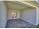 Covered patio area with brick flooring and double doors leading into the home at 4682 Grandview Glen Dr, Auburndale, FL 33823