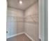 Walk-in closet featuring carpeted floors and wire shelving, perfect for organized storage at 4682 Grandview Glen Dr, Auburndale, FL 33823