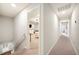 Second floor hallway leading to bedrooms, bathroom and the stairwell to the first floor at 5009 Hanover Ln, Lakeland, FL 33813