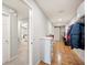 Downstairs hallway with view of bedroom and storage space at 5009 Hanover Ln, Lakeland, FL 33813