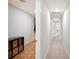 Hallway with storage and view to the hallway to the rest of the living spaces at 5009 Hanover Ln, Lakeland, FL 33813