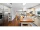Modern kitchen with stainless steel appliances, a center island with a wood countertop, and ample counter space at 5009 Hanover Ln, Lakeland, FL 33813