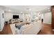 Spacious living room featuring hardwood floors, modern decor, and a comfortable seating area at 5009 Hanover Ln, Lakeland, FL 33813