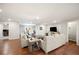 Bright living room featuring hardwood flooring and modern furniture, offering a welcoming and comfortable space at 5009 Hanover Ln, Lakeland, FL 33813
