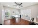 Bright office with natural light, modern ceiling fan, and large white board, perfect for a productive work environment at 5009 Hanover Ln, Lakeland, FL 33813