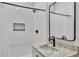 Bathroom featuring single vanity, granite countertop, black hardware and shower at 570 Gandhi Dr, Lakeland, FL 33813