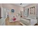 Cozy bedroom with neutral walls and a window providing natural light at 570 Gandhi Dr, Lakeland, FL 33813
