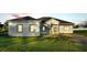 Charming single-story home featuring a well-manicured lawn and a welcoming front entrance at 570 Gandhi Dr, Lakeland, FL 33813