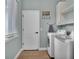 Functional laundry room features modern appliances and ample storage space at 570 Gandhi Dr, Lakeland, FL 33813