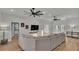 Open living room boasts wood floors, neutral tones, and abundant natural light at 570 Gandhi Dr, Lakeland, FL 33813