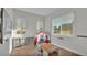 Play Room with table and play house with lots of light from the windows at 570 Gandhi Dr, Lakeland, FL 33813