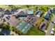 Aerial view of a community with pool, tennis court, pickleball, and clubhouse at 5982 Crane Dr, Lakeland, FL 33809