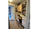 The laundry room also offers a desk and workspace for additional organization at 5982 Crane Dr, Lakeland, FL 33809