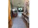 Inviting entryway leading to a spacious living room with wood floors and a neutral color palette at 5982 Crane Dr, Lakeland, FL 33809