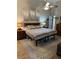 Lovely main bedroom has a ceiling fan, soft carpet, and natural light at 5982 Crane Dr, Lakeland, FL 33809