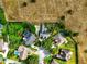 Aerial view of the homes in a neighborhood with well-manicured lawns at 1935 Austin Ter, Winter Haven, FL 33884
