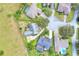 Aerial view of the property outlining the border and backyard with a play structure at 1935 Austin Ter, Winter Haven, FL 33884