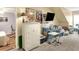 Bedroom with carpet, a large dresser, an office chair, and a wall mounted television on the wall at 1935 Austin Ter, Winter Haven, FL 33884