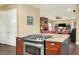 Kitchen island with granite countertop, gas range, and oven at 1935 Austin Ter, Winter Haven, FL 33884