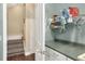 Laundry room with countertop, shelving, and an adjacent stairwell at 1935 Austin Ter, Winter Haven, FL 33884