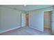 Bedroom with carpeted floor, neutral walls, and base molding at 4688 Grandview Glen Dr, Auburndale, FL 33823