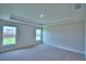 Bedroom featuring neutral paint and carpet, recessed lighting, and tray ceiling at 4688 Grandview Glen Dr, Auburndale, FL 33823