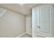 Carpeted walk-in closet with wire shelving and door with nickel hardware at 4688 Grandview Glen Dr, Auburndale, FL 33823