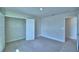 Bedroom showcasing a closet, neutral carpet, and neutral walls at 4694 Grandview Glen Dr, Auburndale, FL 33823