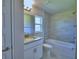 Bright bathroom featuring granite counters, tiled shower and floors at 4700 Grandview Glen Dr, Auburndale, FL 33823