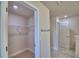 Hallway with open closet and modern design at 4700 Grandview Glen Dr, Auburndale, FL 33823