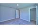 Bedroom features a door and a closet, offering storage and privacy at 4706 Grandview Glen Dr, Auburndale, FL 33823