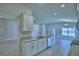 Spacious kitchen with stainless steel appliances, granite counters, and open layout at 4706 Grandview Glen Dr, Auburndale, FL 33823