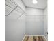A walk-in closet with white wire shelving provides ample storage space at 5225 Golden Gate Blvd, Polk City, FL 33868
