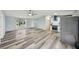 Open-concept living area flows into the kitchen for easy entertaining at 5225 Golden Gate Blvd, Polk City, FL 33868