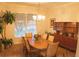 Well-lit dining room featuring a large window, and decorative accents at 108 Lake Region N Blvd, Winter Haven, FL 33881