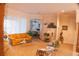 Comfortable living room with an open floor plan leading to the bedroom, and many decorative accents at 108 Lake Region N Blvd, Winter Haven, FL 33881