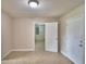 Bright bedroom with tile flooring and an adjacent room at 116 Bishop St, Auburndale, FL 33823