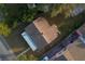 Overhead view showcasing home's roofline and lot at 506 N Wales Dr, Lake Wales, FL 33853
