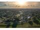 Breathtaking aerial view of the home, nestled in a lush neighborhood with scenic surroundings at 506 N Wales Dr, Lake Wales, FL 33853