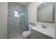 Updated bathroom with walk-in shower, modern vanity, and stylish fixtures at 506 N Wales Dr, Lake Wales, FL 33853