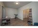 Versatile spare bedroom with laminate wood flooring at 506 N Wales Dr, Lake Wales, FL 33853