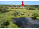 Aerial view of property near a pond at 5225 Imperial Lakes Blvd # 22, Mulberry, FL 33860